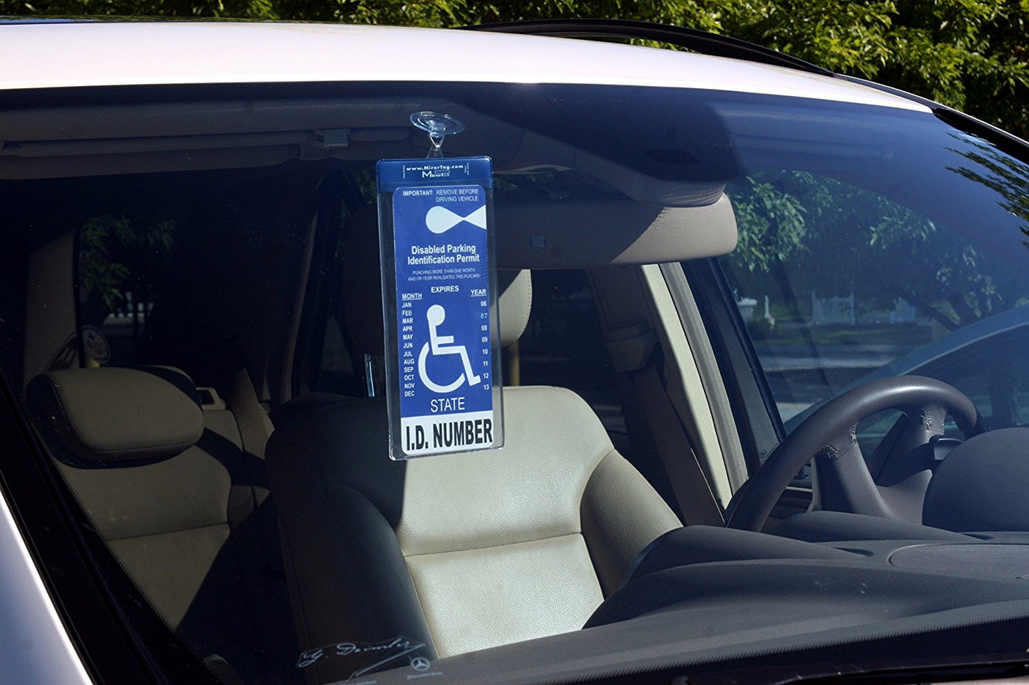 sleeve protector and holder for parking permit placards, magnetically attach with eyes closed