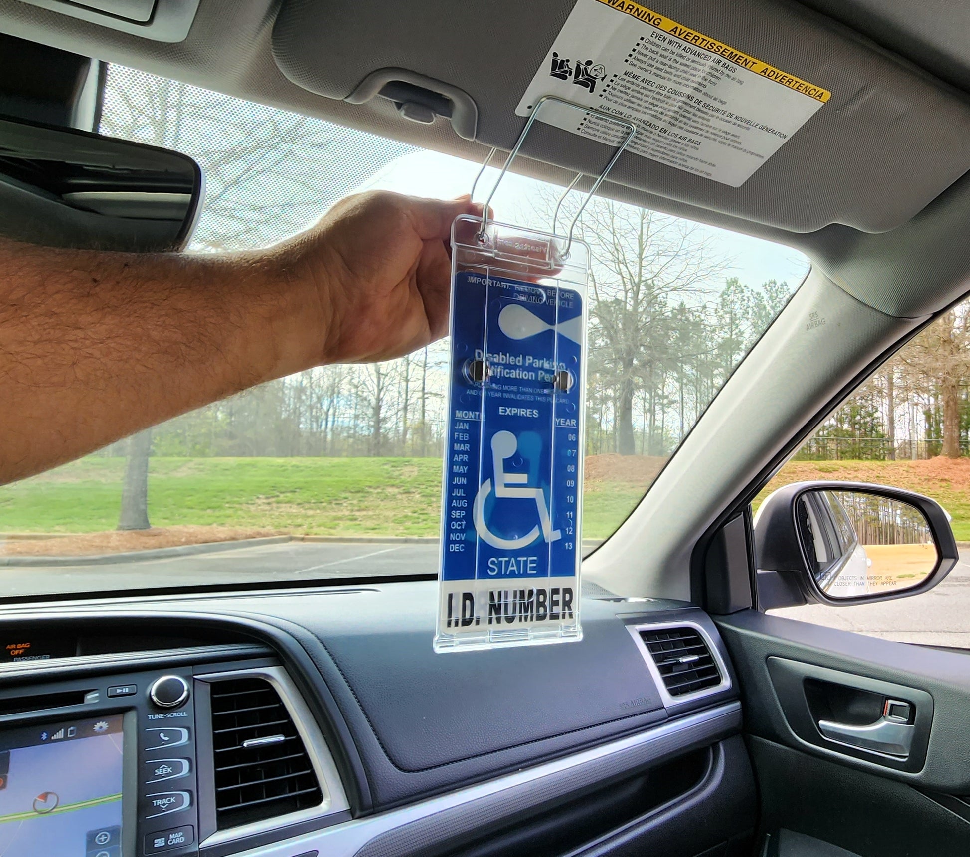 transparent quality plastic cover for handicap card. Clips to visor. Professional appearance placard holder