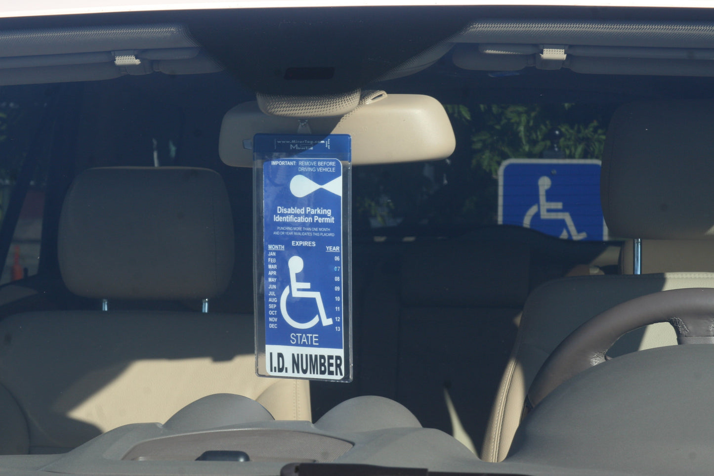 handicap parking permit holder, mirortag attached to magnet charm on rearview mirror