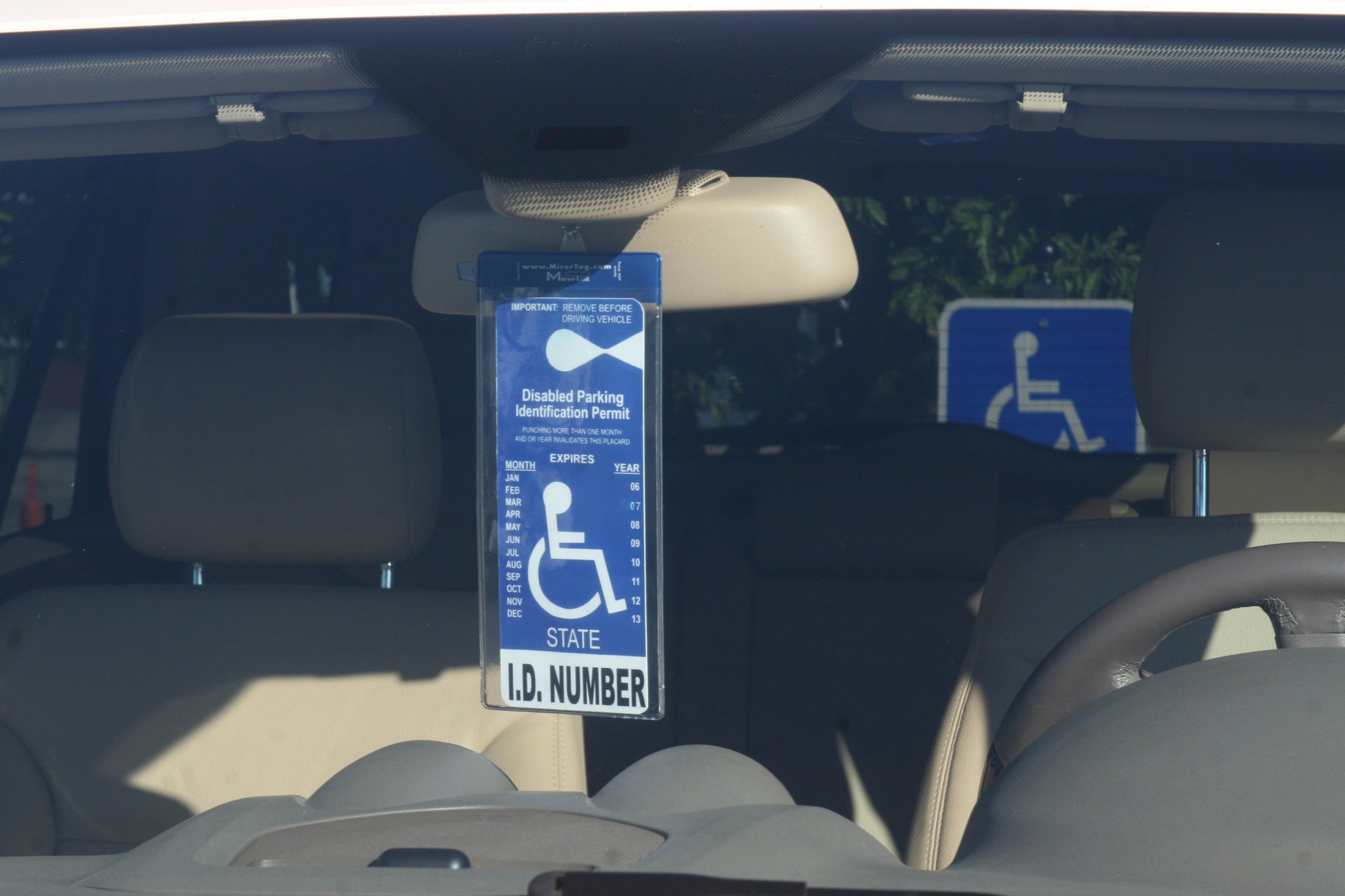 handicap parking permit holder, mirortag attached to magnet charm on rearview mirror