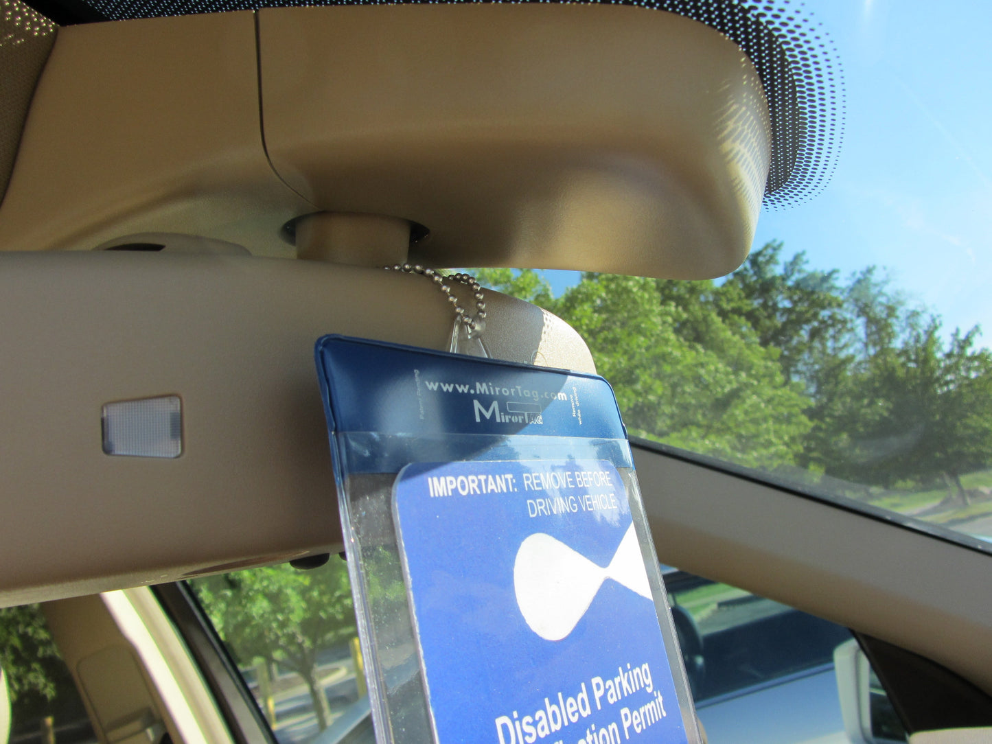 MirorTag Charm™- A Novel Way to Protect, Display & Put Away a Handicap Parking Placard. MAGNETICALLY On & Off. Fits All Mirror Sizes. 1 Holder & 1 Magnet Charm Included. Made in USA