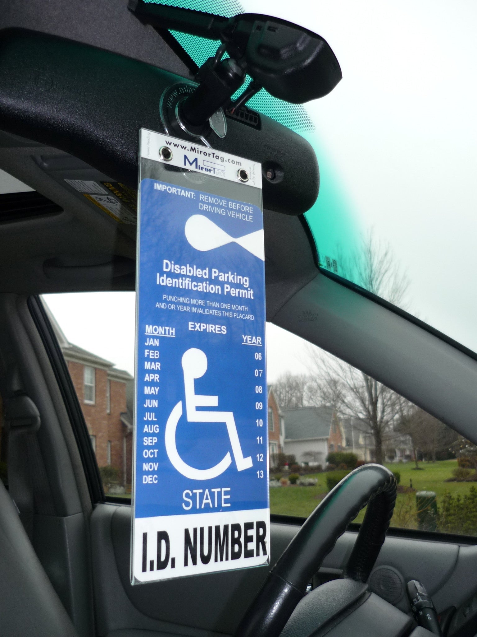 Portable Handicap Placard Holder for Auto. Magnetically display with eyes closed