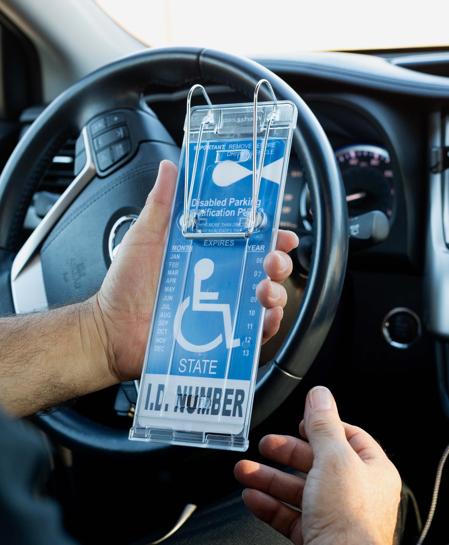 Visor mounted handicapped tag holder. Visortag Vertical for disabled placard